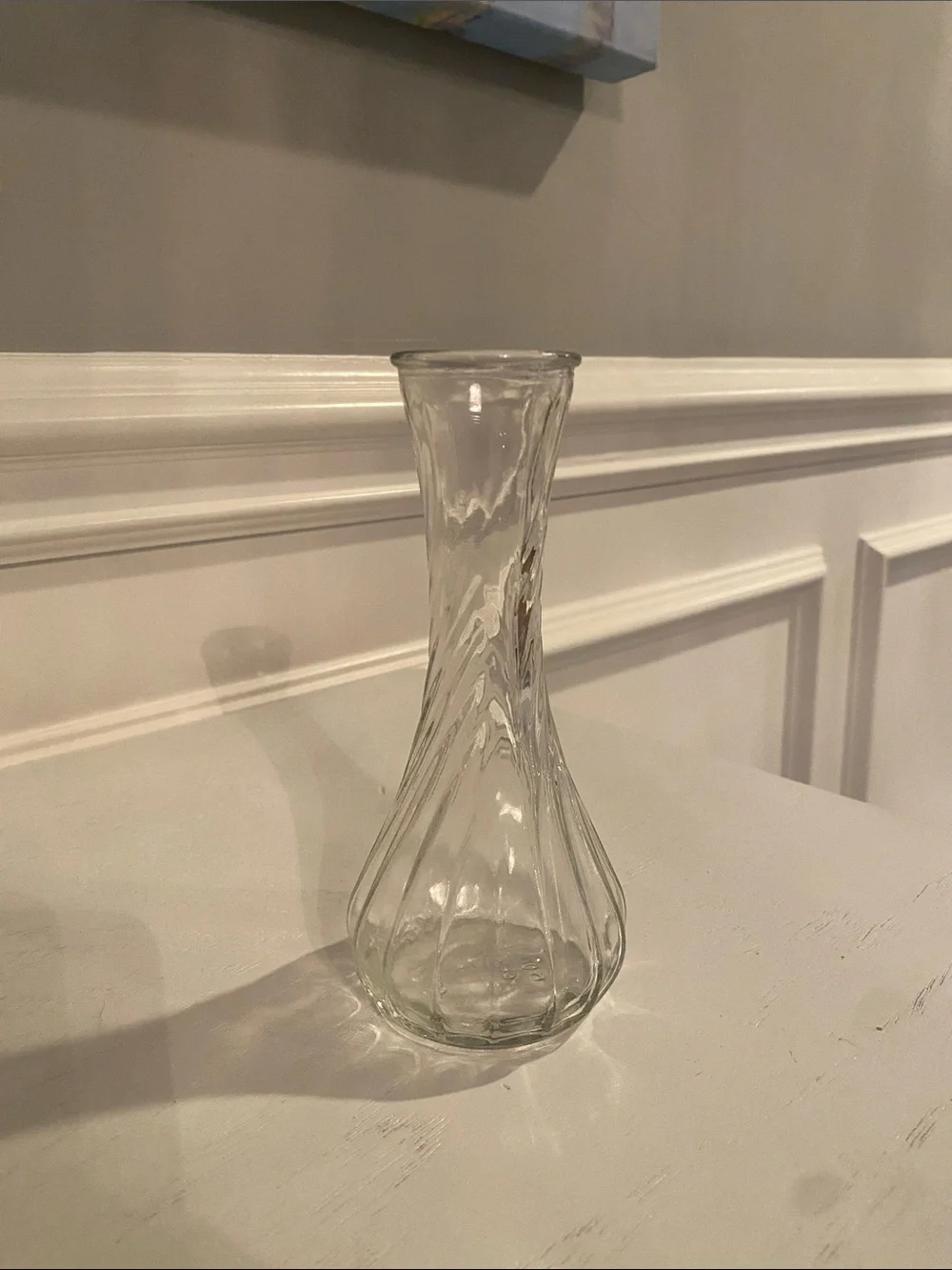 Vintage Hoosier Glass milk glass bud vase featuring a ribbed, fluted pattern.